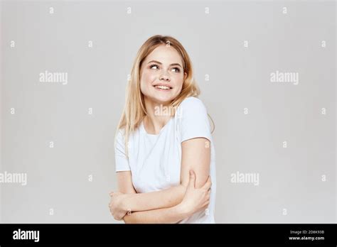 Cute Blonde White T Shirt Gesture With Hands Lifestyle Light Background Stock Photo Alamy