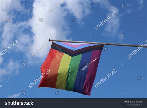 Progress Lgbtq Pride Flag Against Blue Stock Photo 2187012631 ...