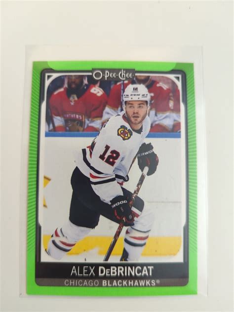 O Pee Chee Neon Green Border Alex Debrincat For Sale