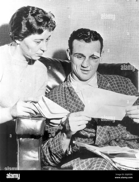 Paul Pender and his wife read congratulatory messages after Pender ...