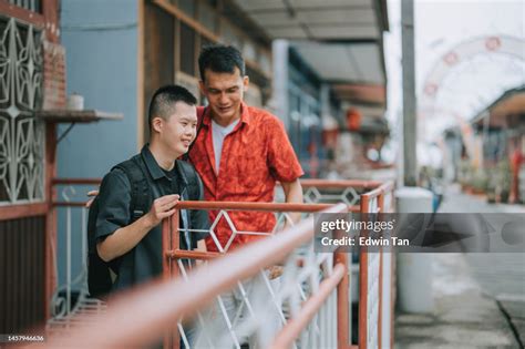 Asian Chinese Down Syndrome Young Man And Father Father Leaving ...