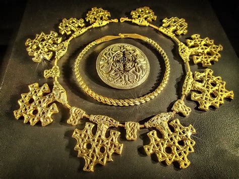 A Gold Reproduction Of A Viking Brooch Armlet And Pendants Flickr