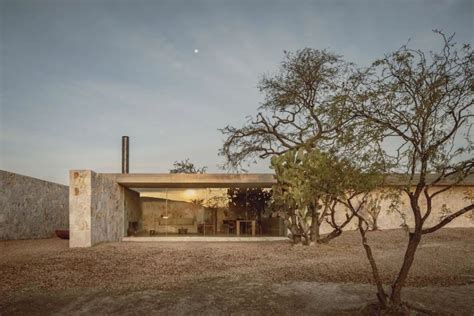 This Stone House Design Embraces Nature & Modernism