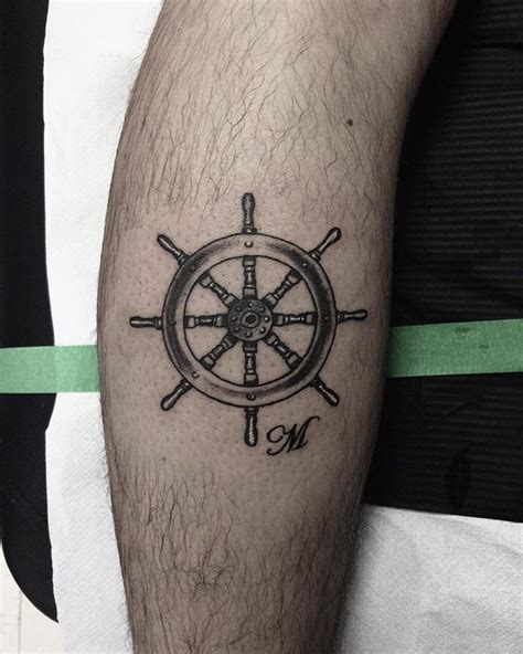 Ships Wheel Tattoo Inked On The Right Shin Wheel Tattoo Tattoos