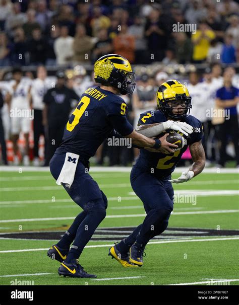 Houston Texas Usa 8th Jan 2024 Michigan Player 9 Qb Jj Mccarthy Handing Off To 2 Rb