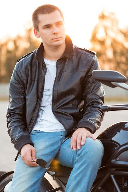 Premium Photo Biker Man Wearing A Leather Jacket And Sunglasses