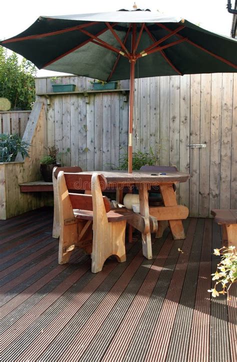 Wooden patio furniture. stock photo. Image of garden - 11571956