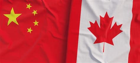 Premium Photo | Flags of china and canada linen flag closeup flag made ...