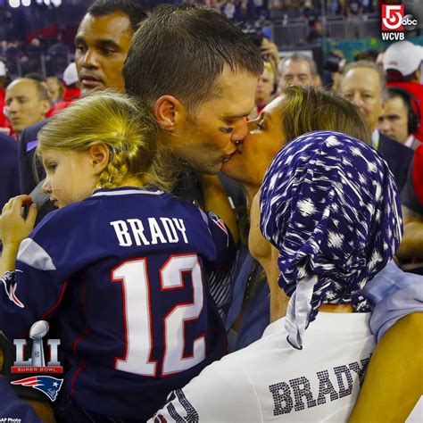 Tom Brady embracing the Super Bowl LI win with his child, wife, and ...