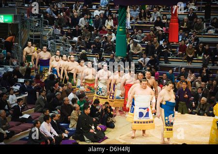 Sumo wrestlers entering sumo wrestling ring for closing ceremony ...