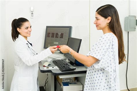 Female patient receiving the mammogram test results at the imaging lab ...