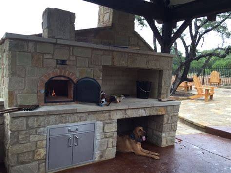 Outdoor wood fired pizza oven + stone outdoor fireplace - Rustic - New ...