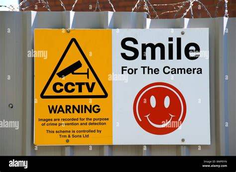 Cctv Warning Sign With Humourous Smile For The Camera Graphic On A