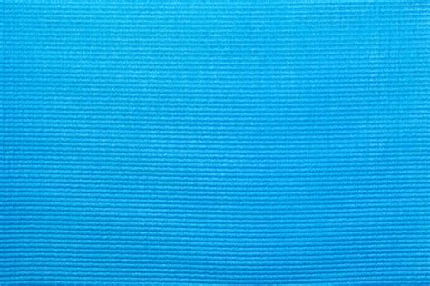 Textura De Una Estera De Yoga Azul En Una Vista De Primer Plano Foto