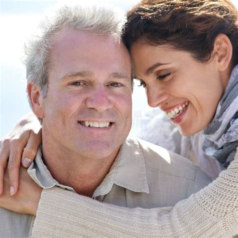 True Love A Happy Mature Couple With Their Heads Together