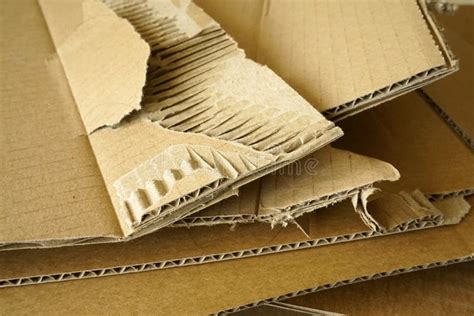 Close Up Of Stacked Corrugated Cardboard Sheets Of Brown Corrugated