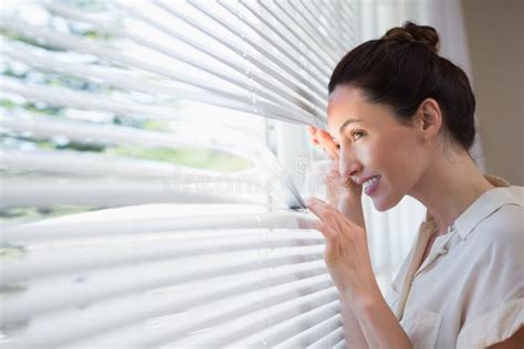 Woman Peeking Through The Blinds Stock Image Image Of Manager Person