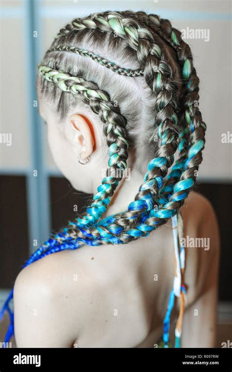 braids on the child, blue hair girl, little Stock Photo - Alamy