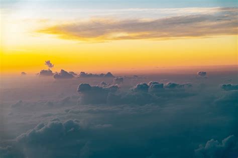 Sunset above the Clouds · Free Stock Photo