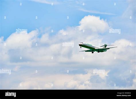 HONG KONG - JUNE 04, 2015: MD-90 landing at Hong Kong airport. The ...