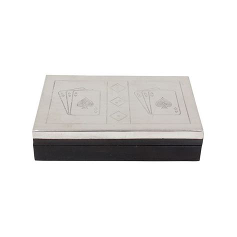 A Metal Box With Two Playing Cards On The Front And One In The Middle