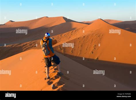 Tourists Photographing Sand Dune 45 In Southern Namib Desert Sossusvlei Namib Naukluft