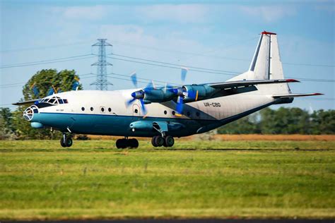 Cavok Air Antonov An Cargo Plane At Airport Apron With Marshaller