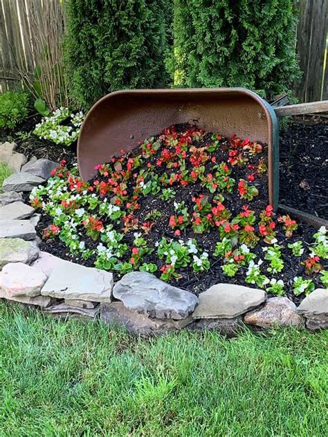 Diy Tipped Wheelbarrow Planter The Honeycomb Home