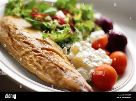 Healthy fish salad Stock Photo - Alamy