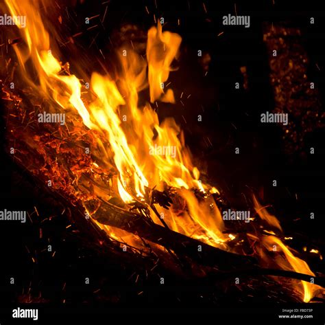 Glow Sparks And Embers Of A Big Bonfire In The Night Stock Photo Alamy