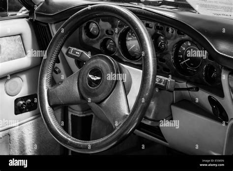 Interior of the driver's seat of the car Aston Martin V8 Volante. Black ...