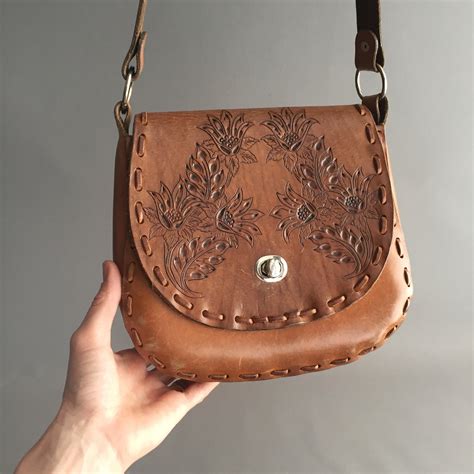 S Leather Tooled Saddle Bag