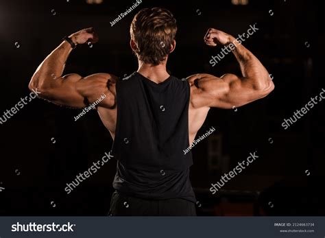 Man Double Flexing His Biceps Bicep Stock Photo 2124663734 | Shutterstock