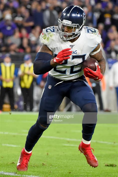 Derrick Henry Of The Tennessee Titans Runs Against The Baltimore