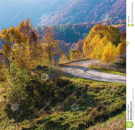 Dirty Secondary Road In Autumn Carpathian Mountain Ukraine Stock Photo