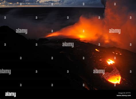 River Of Molten Lava Flowing To The Sea At Sunrise Kilauea Volcano