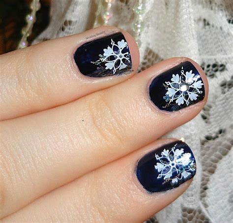 Writing Beauty: Shimmering Snowflakes Nail Art