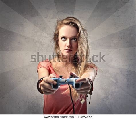 Beautiful Blonde Girl Playing Video Games Stock Photo Edit Now