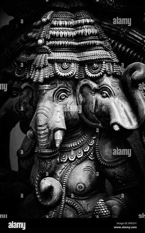 Wooden idol of ganesh Black and White Stock Photos & Images - Alamy