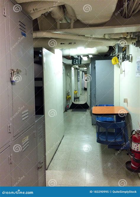 Hallway Passageway With Exit Sign And Locker On Ship Stock Image