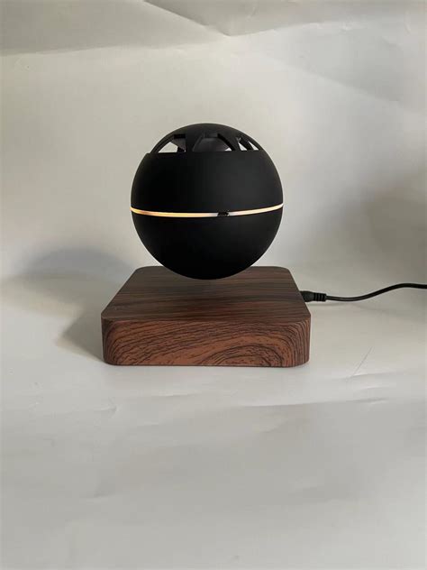 Wooden Color Magnetic Levitation Rotating Floating Bluetooth Wireless
