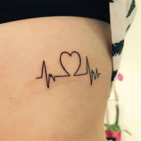 22 Photos of Inspiring Heartbeat Tattoos