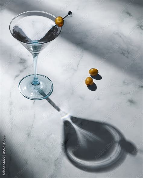 Martini with olives Stock Photo | Adobe Stock