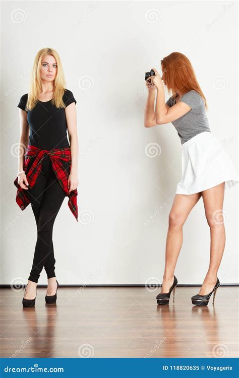 Mulatto Girl Photographing Blonde Woman Stock Image Image Of Female Fashion