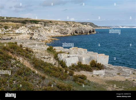 Portland Stone Along The Rocky Quarried Coastline At Portland Bill