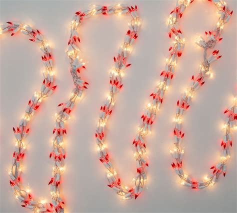 Red And Clear Incandescent Garland Lights With White Wire