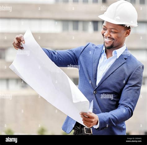 Construction City And Business Black Man With Blueprint Floorplan And