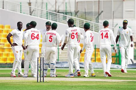 The Zimbabwe players celebrate a wicket | ESPNcricinfo.com