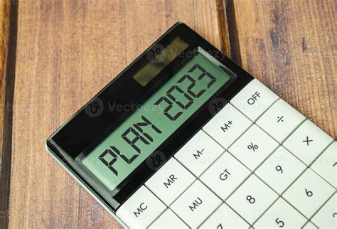 Calculator with Year 2023 plan on chart and pen 12795743 Stock Photo at ...