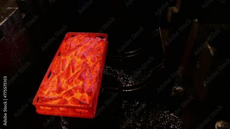 Hardening Process Of Metal Parts Controlled Cooling With Oil And Water Quenching Hot Red